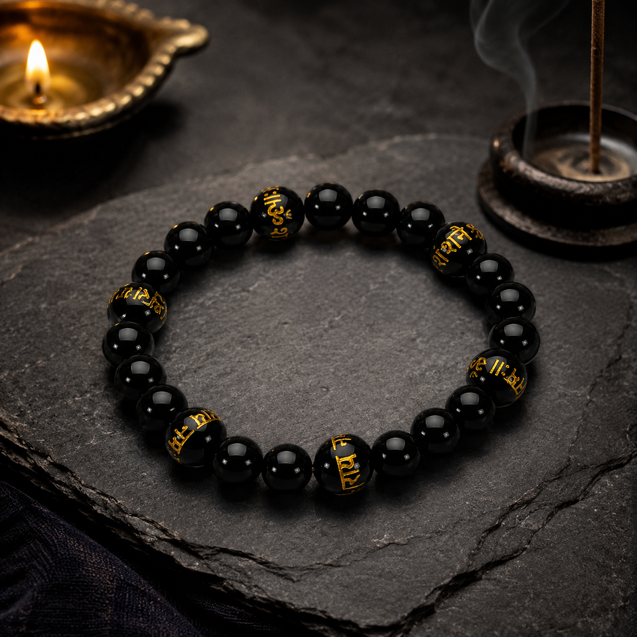 Black Onyx Bracelet with Shani Mantra — worn on the wrist — KaalVeda