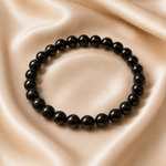 Black Tourmaline Bracelet — worn on the wrist — KaalVeda