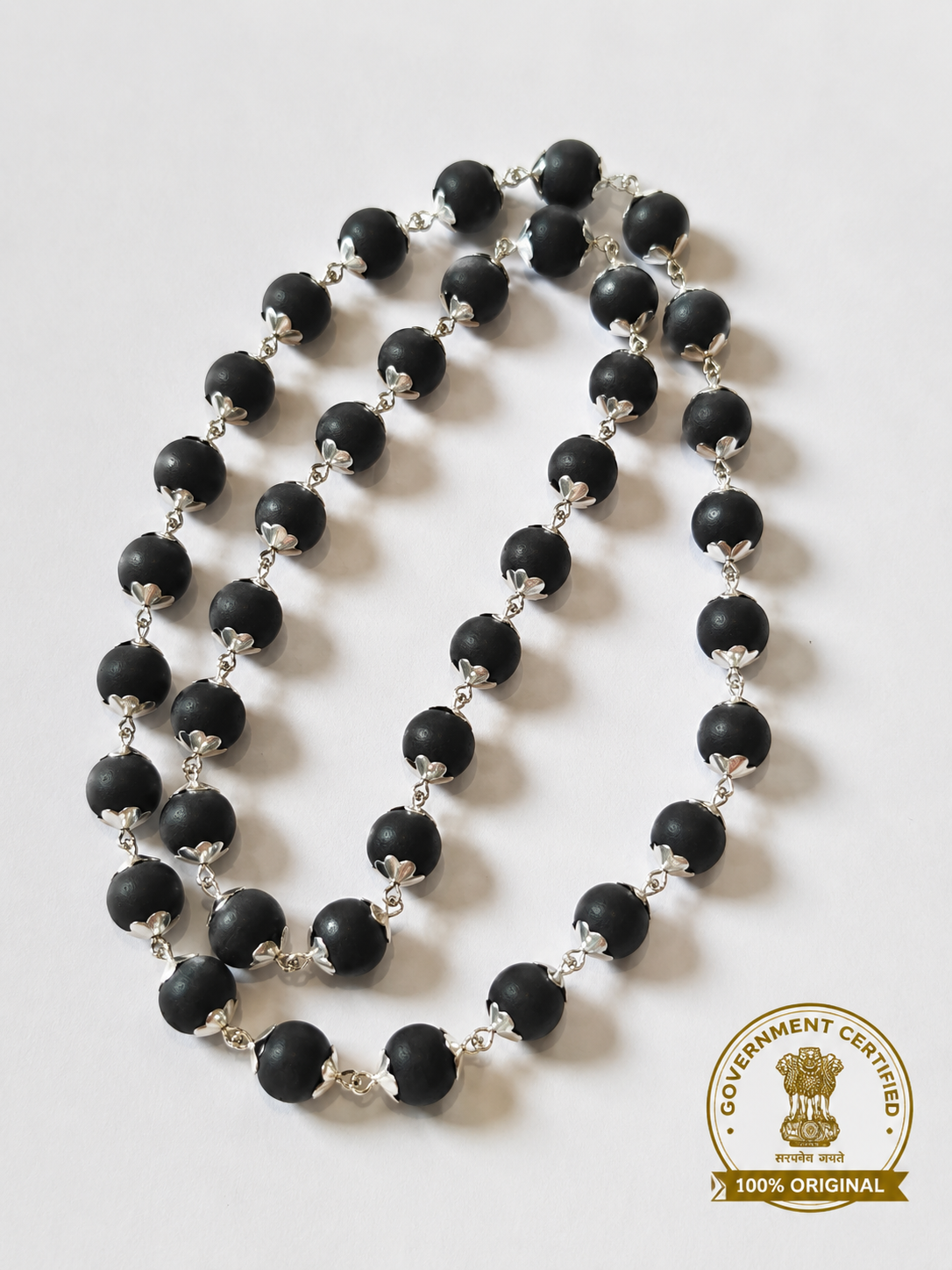 Silver-Capped Karungali Malai — detail of the capped and linked beads — KaalVeda