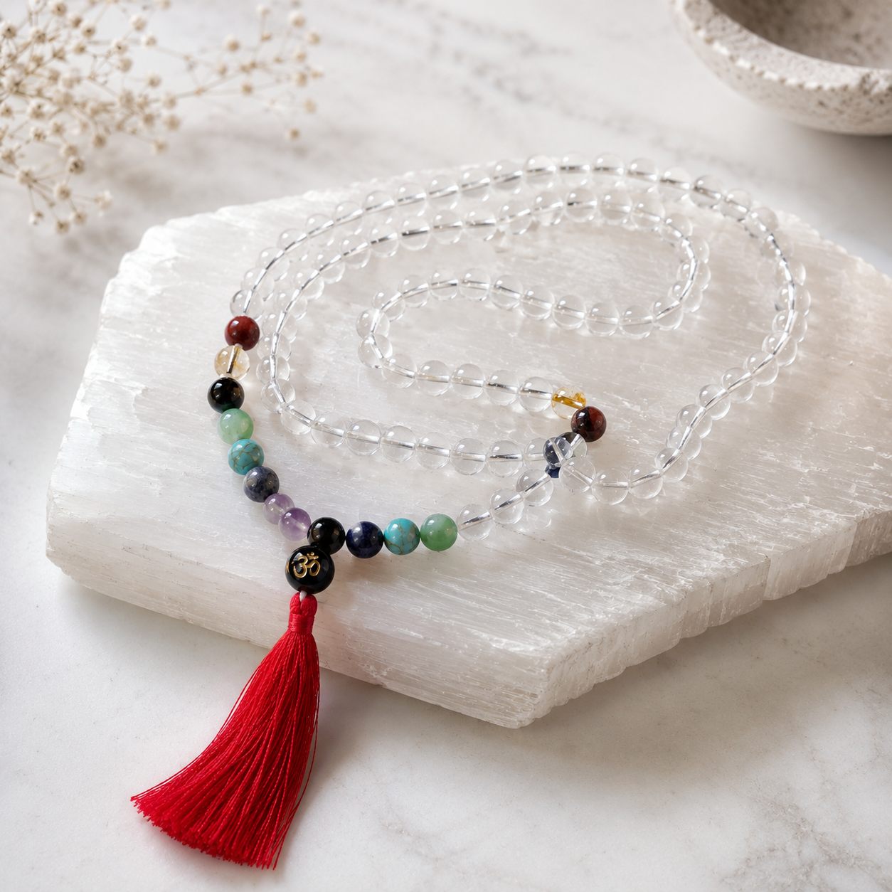 Clear Quartz Sphatik 7 Chakra Mala — angled view of the full mala — KaalVeda