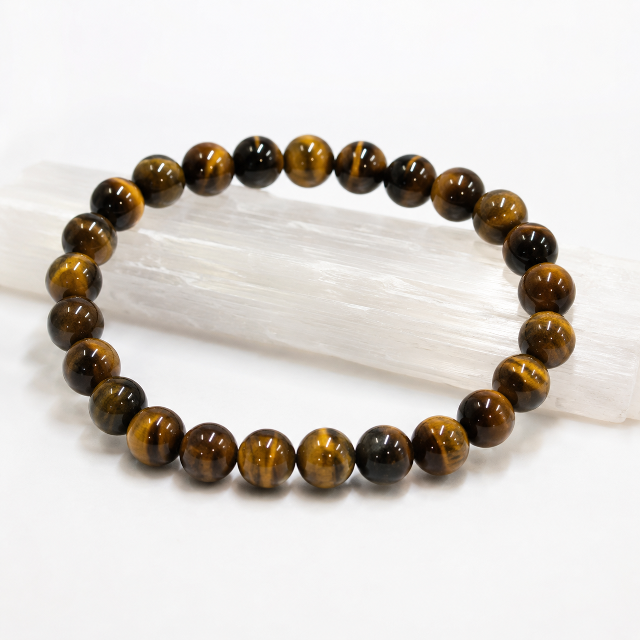 Tiger Eye Bracelet — angled view showing the golden chatoyant band — KaalVeda